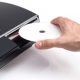 PlayStation3withCDinserting.jpg